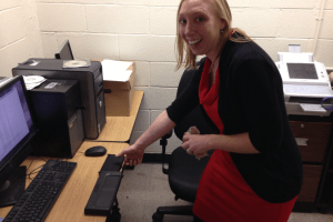 Waiting at the station to be finger printed- paper towels in hand to dry my sweat!